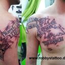 Weltkarte mit Schrift Robbys Tattoo