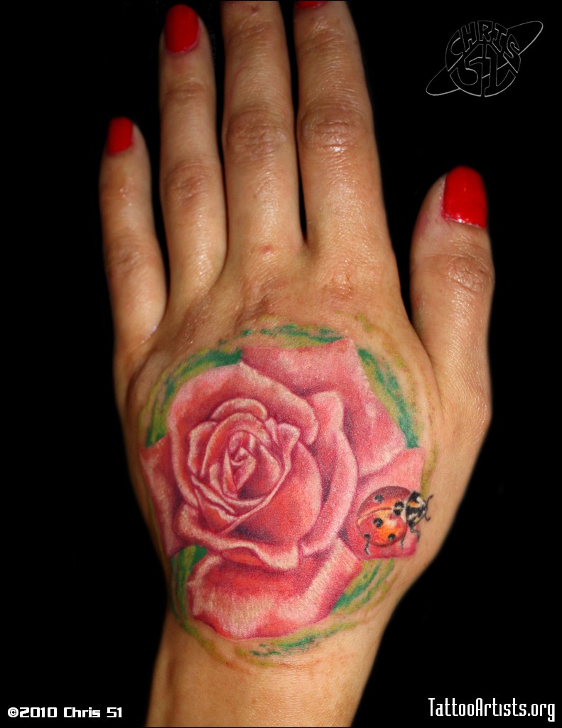 Img207646_Chris_51-Hand_rose_and_ladybug_w-logo.jpg