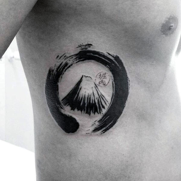 gentleman-with-volcano-enso-tattoo-on-rib-cage-side-of-body.jpg